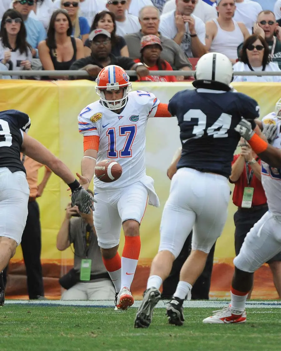 Chas Henry kicking a football