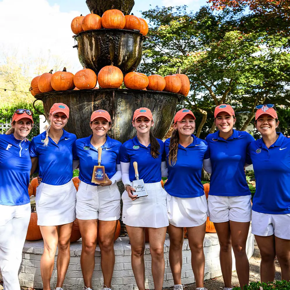 Team photo with trophies